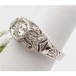 Ladys diamond ring with a .52Ct round 