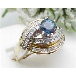 Ladys ring 1Ct Montana sapphire and 1.