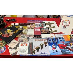 A Yukon Beer Ephemera Collectible Lot. Pins, Coasters, Buttons Etc