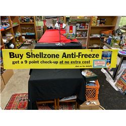 a 68" Long and 12 " Shell Zone Antifreeze Sign. Double Sided Cardboard