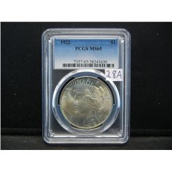 1922 Peace Dollar.  Slabbed by the best, PCGS, as MS 65 GEM.  Nearly mark free.