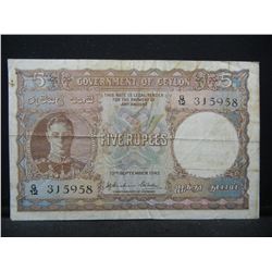 1941 Ceylon 5 Rupees.  These old British related notes are scarce.  Very Fine.