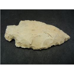 2 3/4 inch probable Ohio dove tail.  Approximately 9000 years old(Archaic).  Light tan.