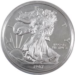 1987 USA 1 Pound Liberty .999 Fine Silver Coin. Contains 12oz (TAX Exempt). Capsule lightly scra