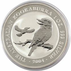 2004 Australia $5 1oz Kookaburra Fine Silver Coin in Capsule (lightly toned). Lowest mintage year of