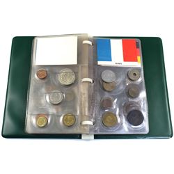 11x World Coin Sets in Plastic Pages Contained in a Small Green Binder. You will receive coin sets f