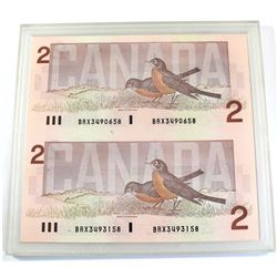 Pair of 1986 $2 BRX Replacement Notes S/N: BRX3490658 & 3493158. Both notes are UNC and come in hard