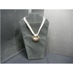 Gold emblem lady necklace