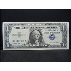 1957-A $1 Blue Seal Silver Certificate.  Nice Crisp Note.  Serial # H60180844A