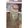Image 5 : TWO BUTTER CHURNS (BOTH CRACKED), MILK BOTTLES, JARS, ETC.