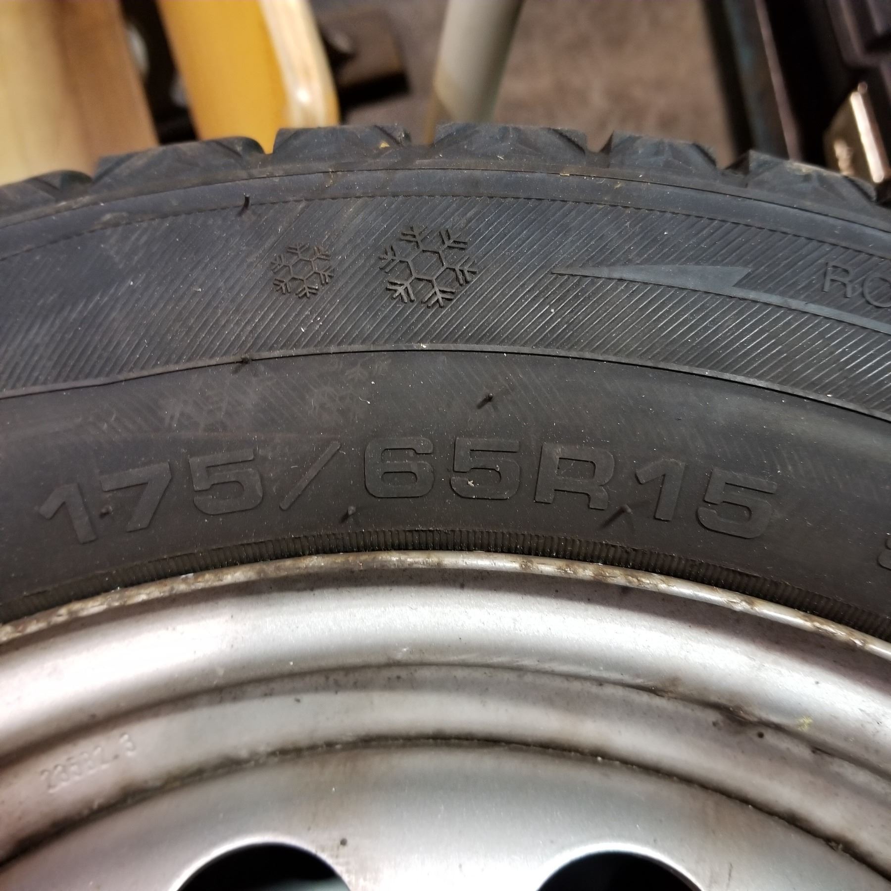 SET OF 4 175/ 65 R15 TIRES ON 4 BOLT RIMS