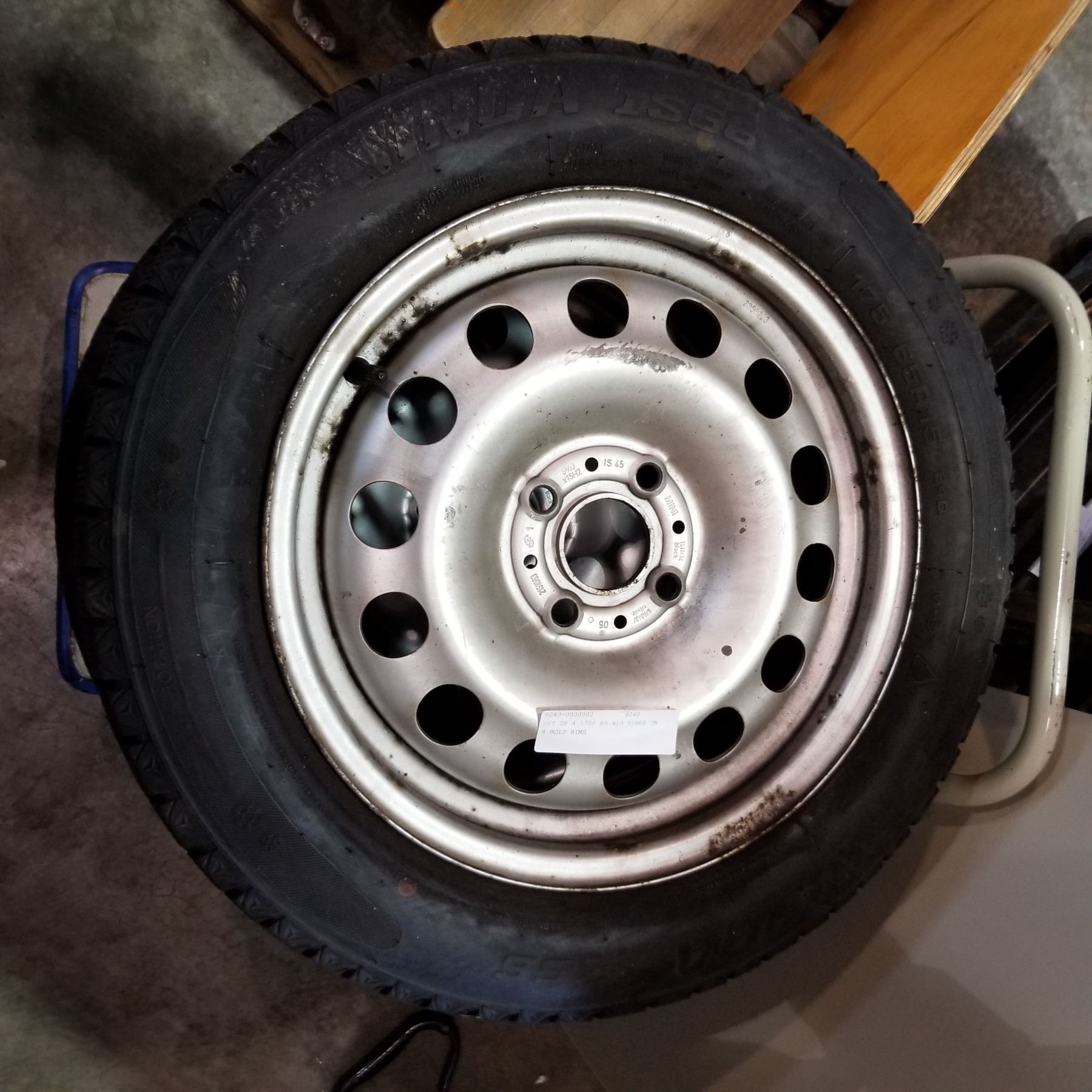 SET OF 4 175/ 65 R15 TIRES ON 4 BOLT RIMS