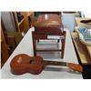 Image 1 : UKULELE MODEL 8765 M AND LEATHER FOOTSTOOL