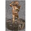 Image 1 : Un sujet en bronze représentant un cupidon en pie