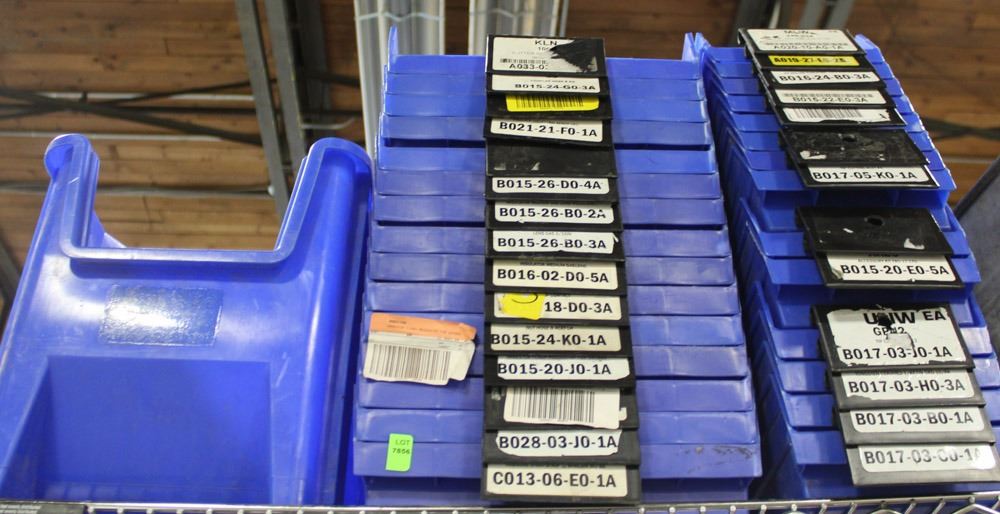 STACK OF HEAVY PLASTIC BOLT BINS