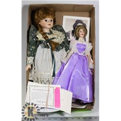 PAIR OF PORCELAIN DOLLS