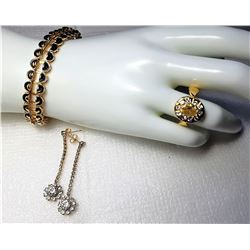 12)  SUITE OF GOLD TONE AND CRYSTAL