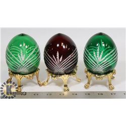 SET OF 3 CRYSTAL EGGS W/ BRASS STANDS  - ONE RED