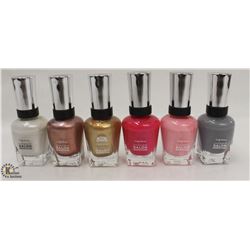 6 BOTTLES OF ASSORTED COLOR SALLY HANSEN COMPLETE SALON MANICURE NAIL POLISH. 14.7ML PER BOTTLE