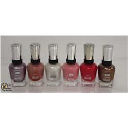 6 BOTTLES OF ASSORTED COLOR SALLY HANSEN COMPLETE SALON MANICURE NAIL POLISH. 14.7ML PER BOTTLE