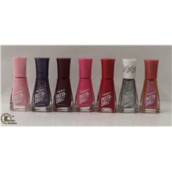 BAG OF ASSORTED COLOR SALLY HANSEN INSTA-DRI NAIL COLOR.