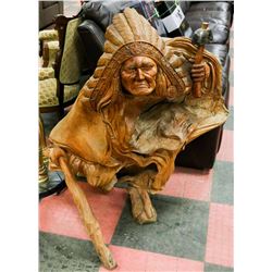 HAND CARVED MEDICINE MAN  " FORMING FROM THE WIND" 44cm H x 39 cm W x 39 cm L