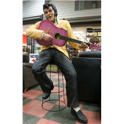 6FT ELVIS ON A STOOL WITH GUITAR.