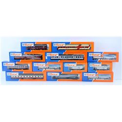 BOX OF ASSORTED ROCO MODEL TRAIN CARS.