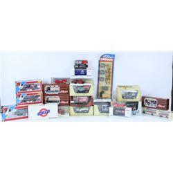 BOX OF ASSORTED DIE CASTS AND TRAIN CARS.