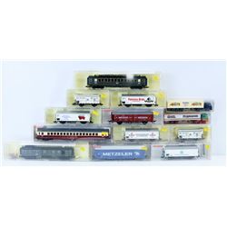 FLAT OF ASSORTED MODEL TRAIN CARS. HO SCALE