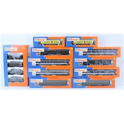 BOX OF ASSORTED ROCO MODEL TRAIN CARS. HO SCALE