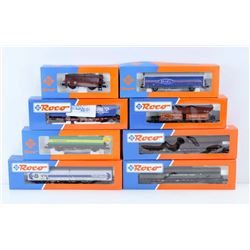 BOX OF ASSORTED ROCO MODEL TRAIN CARS. HO SCALE