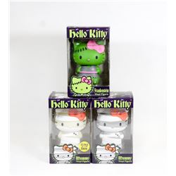LOT OF 3 HELLO KITTY VINYL FIGURES.