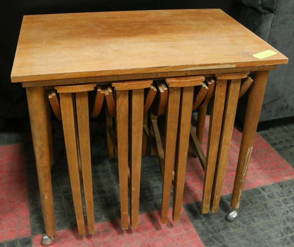 VINTAGE WOODEN TABLE WITH 4 STACKING TABLES. Kastner Auctions