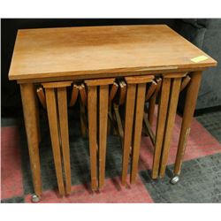 VINTAGE WOODEN TABLE WITH 4 STACKING TABLES.