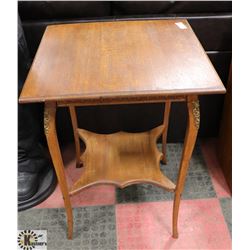 1940'S OAK END TABLE WITH BRASS ACCENTS