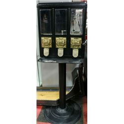 COIN OPERATED CANDY MACHINE.
