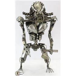 STEAM PUNK STYLE PREDATOR-LIKE FIGURE.