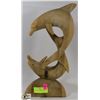 Image 1 : WOOD CARVED DOLPHIN FIGURE.