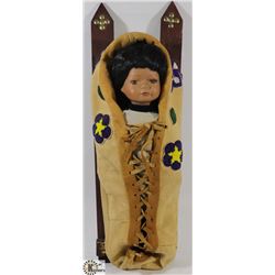 FIRST NATIONS DOLL ON PAPOOSE BOARD