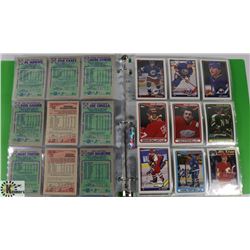 VINTAGE HOCKEY CARD COLLECTION IN BINDER.