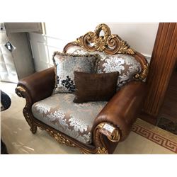 OVER SIZED LEATHER AND FLORAL PRINT LOUNGE CHAIR.  RETAIL $3,900.00