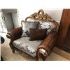 Image 1 : OVER SIZED LEATHER AND FLORAL PRINT LOUNGE CHAIR.  RETAIL $3,900.00