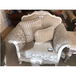 OVER STUFFED RAISED FLORAL PRINT WITH WOOD TRIM LOUNGE CHAIR.  RETAIL $1,650.00