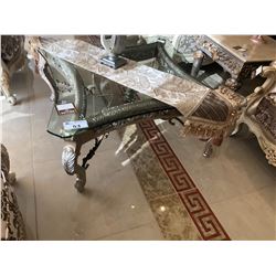 GLASS TOP COFFEE TABLE WITH CARVED WOOD BASE, COMES WITH TABLE RUNNER AND DECOR ITEM.