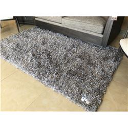 SILVER LONG SHAG AREA RUG.  APPROX. 5' X 8'