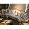 Image 1 : SPECTACULAR CARVED WOOD FRAME SECTIONAL SOFA WITH FLORAL PRINT AND THROW CUSHIONS.