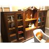 Image 1 : LARGE DARK WOOD WALL UNIT, APPROX. 15' WIDE.  WITH GLASS DOORS.  RETAIL $4,800.00