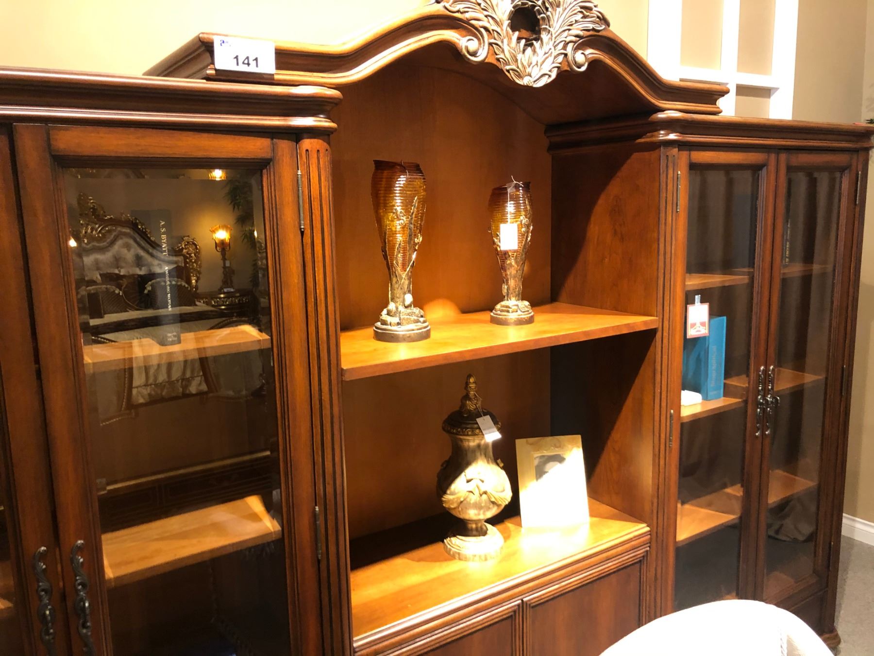 LARGE DARK WOOD WALL UNIT, APPROX. 15' WIDE. WITH GLASS DOORS. RETAIL