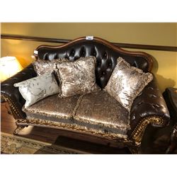 DARK BROWN LEATHER WITH WOOD FRAME LIVING ROOM SET INCLUDES SOFA AND CHAIR WITH THROW CUSHIONS.